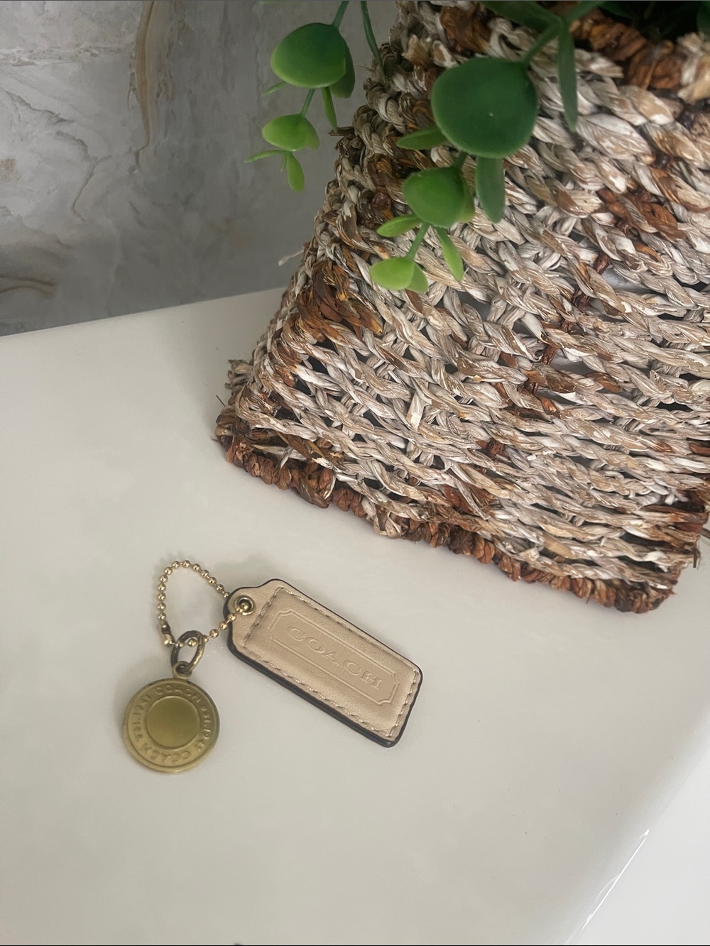Coach Beige Leather Tag with Gold Medallion Charm

Some discoloration
